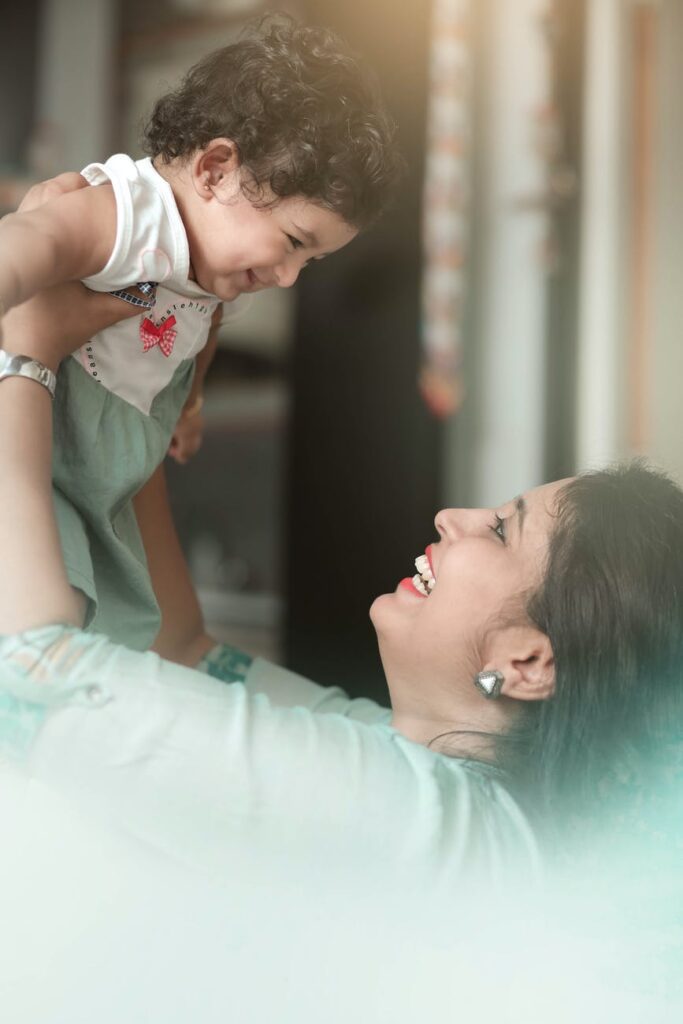 woman carrying baby